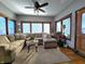 Spacious living area with sectional sofa, hardwood floors, and lots of natural light at 5419 E Shae Lake Dr, Mooresville, IN 46158