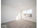 Bedroom with natural light and neutral colored carpet at 5592 Cattail Branch Ln, Clayton, IN 46118