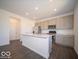 Well-equipped kitchen with a large island and plenty of cabinet space at 5592 Cattail Branch Ln, Clayton, IN 46118