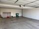 Spacious attached garage with ample storage space at 706 Shagbark Ct, Plainfield, IN 46168