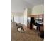 Modern kitchen with stainless steel appliances and wood cabinets at 706 Shagbark Ct, Plainfield, IN 46168