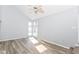 Bright living room with large windows and hardwood floors at 7358 Benoit Dr, Indianapolis, IN 46214