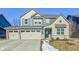 Two-story house with a three-car garage and landscaped lawn at 7384 Cambridge Pl, Avon, IN 46123