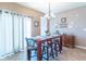 Cozy dining area featuring a wooden table, comfortable seating, and elegant decor, perfect for Gathering meals at 7730 Belmac Ln, Camby, IN 46113