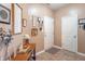 Inviting entryway featuring decorative wall art and a stylish console table, setting a welcoming tone at 7730 Belmac Ln, Camby, IN 46113