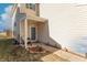 Cozy covered front porch with neutral siding, leading to a welcoming entrance of this lovely home at 7730 Belmac Ln, Camby, IN 46113