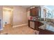 Functional kitchen area featuring stainless steel appliances, ample counter space and tile flooring at 7730 Belmac Ln, Camby, IN 46113