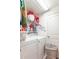 Practical laundry room with modern appliances, storage shelves, and ample space for sorting and folding at 7730 Belmac Ln, Camby, IN 46113