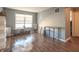 Bright room features wood floors, a large window, and versatile space for various activities at 7730 Belmac Ln, Camby, IN 46113