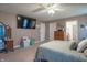 This main bedroom offers a ceiling fan and plenty of space to relax and unwind at 7730 Belmac Ln, Camby, IN 46113