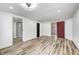 Finished basement features LVP flooring, and an ensuite bathroom at 940 W 53Rd St, Indianapolis, IN 46208