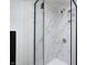 Modern shower with marble tile and black frame at 940 W 53Rd St, Indianapolis, IN 46208