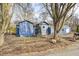 Front view of blue house with double garage at 940 W 53Rd St, Indianapolis, IN 46208