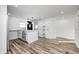 Open concept kitchen with white cabinets and island at 940 W 53Rd St, Indianapolis, IN 46208