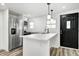 Modern kitchen with white cabinets and stainless steel appliances at 940 W 53Rd St, Indianapolis, IN 46208