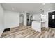 Modern kitchen with island and stainless steel appliances at 940 W 53Rd St, Indianapolis, IN 46208