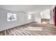 Bright living room with hardwood floors and natural light at 940 W 53Rd St, Indianapolis, IN 46208