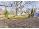 Landscaped yard with brick accents and a small fountain at 940 W 53Rd St, Indianapolis, IN 46208
