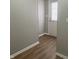 Light neutral-toned entryway with wood-look flooring at 9710 E 38Th St, Indianapolis, IN 46235