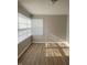 Bright living room with hardwood floors and neutral walls at 9710 E 38Th St, Indianapolis, IN 46235