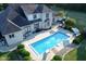 Luxury home with inground pool, patio, and landscaping at 10100 Sanctuary Dr, Brownsburg, IN 46112