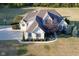 Brick house with 3-car garage, large yard, and basketball court at 10100 Sanctuary Dr, Brownsburg, IN 46112