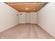 Unfinished basement with carpeted floor and white brick walls at 10100 Sanctuary Dr, Brownsburg, IN 46112