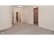 Basement hallway with access to bathroom and closet at 10100 Sanctuary Dr, Brownsburg, IN 46112