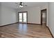 Bedroom with hardwood floors and access to backyard at 10100 Sanctuary Dr, Brownsburg, IN 46112