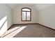 Bright bedroom with large window and neutral carpeting at 10100 Sanctuary Dr, Brownsburg, IN 46112