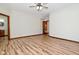 Bright bedroom with hardwood floors and ceiling fan at 10100 Sanctuary Dr, Brownsburg, IN 46112