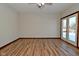Bedroom with hardwood floors and access to backyard at 10100 Sanctuary Dr, Brownsburg, IN 46112