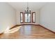 Bright dining room with hardwood floors and bay windows at 10100 Sanctuary Dr, Brownsburg, IN 46112