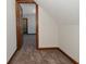 Carpeted hallway with access to additional rooms at 10100 Sanctuary Dr, Brownsburg, IN 46112