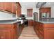 Modern kitchen with farmhouse sink and wood cabinets at 10100 Sanctuary Dr, Brownsburg, IN 46112