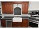 Farmhouse sink with dark grey countertop at 10100 Sanctuary Dr, Brownsburg, IN 46112
