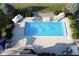 Inviting in-ground pool with a slide and patio area at 10100 Sanctuary Dr, Brownsburg, IN 46112