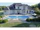 Large in-ground pool with a slide and basketball hoop; backyard oasis at 10100 Sanctuary Dr, Brownsburg, IN 46112