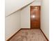 Small room with carpeted floor and wood door at 10100 Sanctuary Dr, Brownsburg, IN 46112