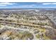 Picturesque aerial shot of a neighborhood near the water, showcasing dense housing and green spaces at 11237 Baycreek Dr, Indianapolis, IN 46236