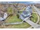 Backyard aerial view of home with shed, mature trees and wooden deck at 11237 Baycreek Dr, Indianapolis, IN 46236