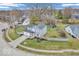 Aerial view of a well-maintained home with a lush, green lawn and mature trees at 11237 Baycreek Dr, Indianapolis, IN 46236