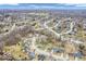 Expansive aerial view of a residential neighborhood with tree-lined streets and diverse home styles at 11237 Baycreek Dr, Indianapolis, IN 46236
