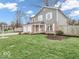 Inviting two-story home featuring a brick facade and well-kept front lawn at 11237 Baycreek Dr, Indianapolis, IN 46236