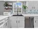 Inviting kitchen with modern stainless steel appliances, undermount sink, and open window at 11237 Baycreek Dr, Indianapolis, IN 46236