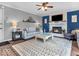 Comfortable living room with fireplace and cozy seating at 11237 Baycreek Dr, Indianapolis, IN 46236