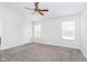 Spacious bedroom featuring neutral walls, soft carpet and a ceiling fan at 12243 Carriage Stone Dr, Fishers, IN 46037