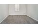 Bedroom featuring neutral walls, carpeted floors, and natural light from the window at 12243 Carriage Stone Dr, Fishers, IN 46037