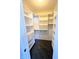 Spacious walk-in closet with custom shelving and double drawers at 123 S Morris Blvd, Bargersville, IN 46106