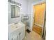 Bathroom with vanity and access to bedroom at 1307 W Congress Ave, Indianapolis, IN 46208